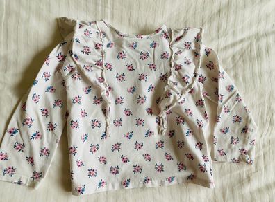 Floral top with ruffle details