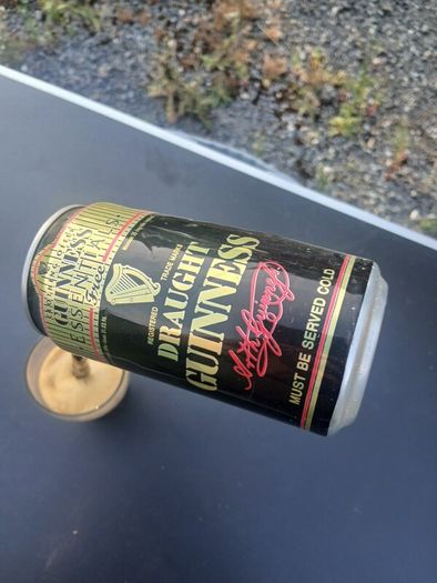 guiness can pouring illusion