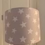A lovely star print drum lampshade in excellent condition - perfect for kids' bedroom. Neutral grey shade. Fun and stylish! Image 6