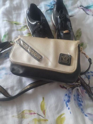 Selling  both together bag new with tags amd black and gold ladies trainers