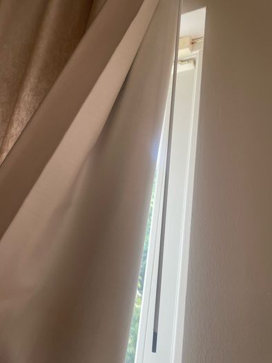 Wave fold curtain and slim line ceiling track