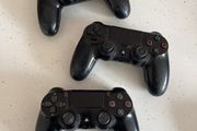3 ps4 controllers ( for parts or repair )