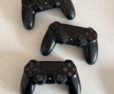 3 ps4 controllers ( for parts or repair )