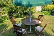 Garden Furniture including table 5 chairs four cushions and parasol