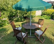 Garden Furniture including table 5 chairs four cushions and parasol
