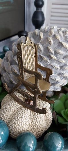 Vintage brass rocking chair