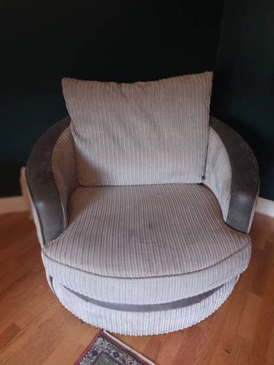 Grey swivel armchair