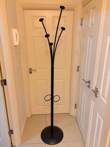 Black metal coat stand