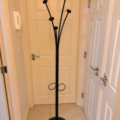 Black metal coat stand