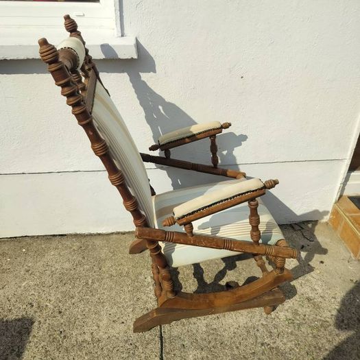 Swinging antique armchair