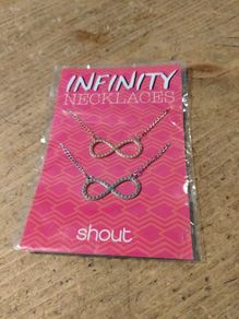 infinity symbol necklaces feature a delicate chain and pendant, new never opened