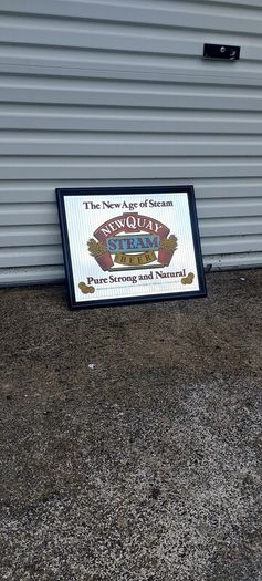 The New age of steam beer mirror ,,newquay,lovely advertising display beer mirror,,nice in any home bar or man cave pub restaurant etc, buyer collects, see pictures for condition, sold as seen.