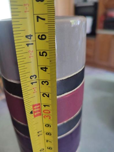 Lovely tall vase  handcrafted slight variations occur giving each product its own uniqueness.