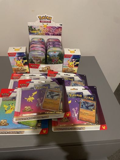 Pokemon 30th anniversary tin collection booster bundle blister packs