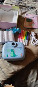 Camera With Mini Photo Printer.