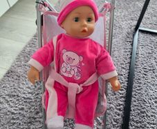 Stroller and talking doll