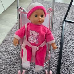 Stroller and talking doll