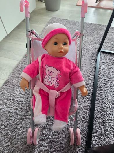 Stroller and talking doll
