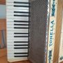 Vintage 1950's Tonella 34-Key/80-Bass Piano Accordion. With Case, Music books and sheet music. Image 2