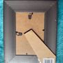 Gold-colored photo frame. Image 2
