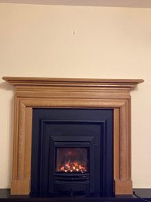 Gas Fire and solid wood surround
