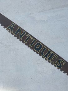 Antiques crosscut saw blade sign