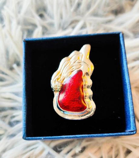 Unique design ring with a red angel wing stone