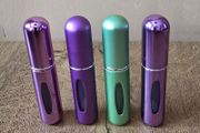 4 mini perfume spray bottles