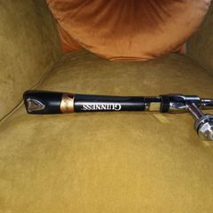 Guinness tap with stainless steel creamer nozzle.