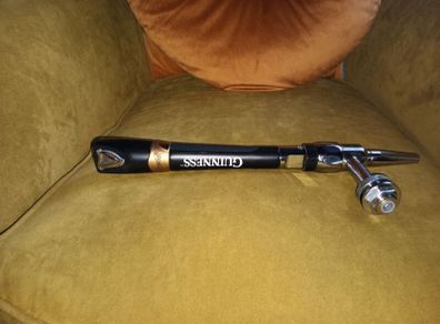 Guinness tap with stainless steel creamer nozzle.