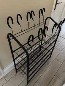 Black metal shoe rack