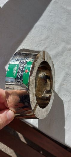Heineken metal ashtray ,used condition, still nice condition ,buyer collects or pays postage thank you, sold as is,