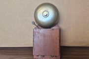 vintage wood-cased block bell or electric alarm bell