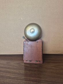 vintage wood-cased block bell or electric alarm bell