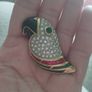 Beautiful vintage parrot brooch covered with rhinestones with enamel accents. Image 8