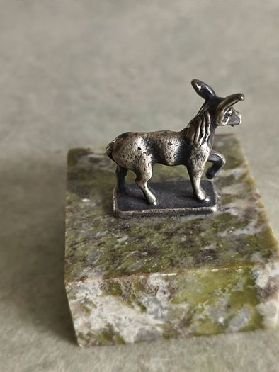 Donkey/mule figure on GREEN Connemara marble plate .