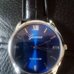 Nice New man's watch. Blue face. Black strap.