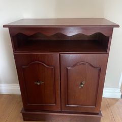 Dark wood sideboard