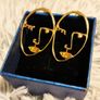 Golden Artistic Face-Shaped Earrings Minimalist Statement Jewelry Image 6