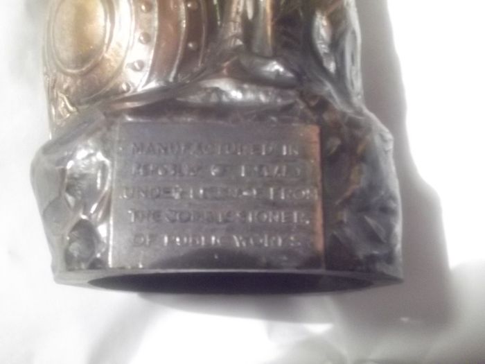 a bronze or metal the death of cuchulainn statue