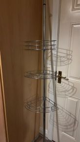 Shower corner shelf
