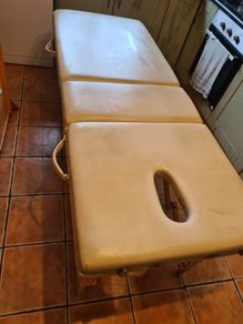 Massage table