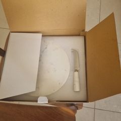 marble cheesboard with knife