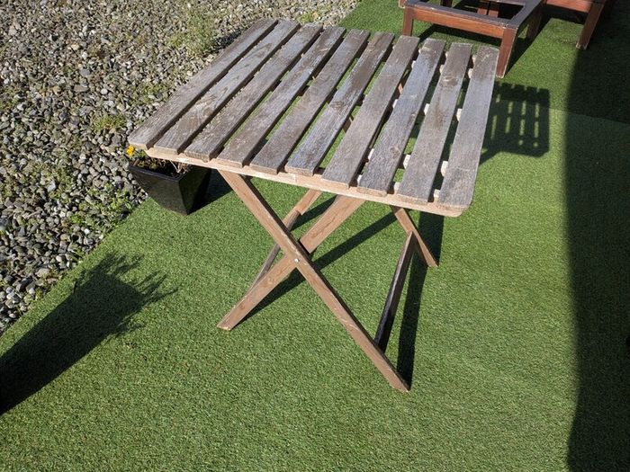 Folding wooden garden table