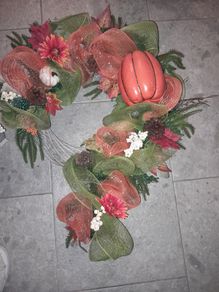 Door Wreath ( Giant- sized) and floral arrangement.