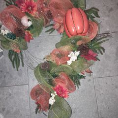 Door Wreath ( Giant- sized) and floral arrangement.