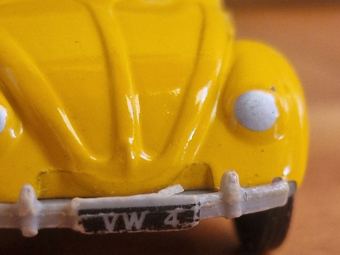 4 vintage toy cars -