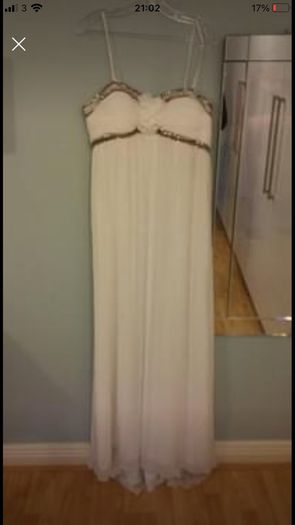 Brand new with tag designer handmade wedding dress by Dresscode. Grecian style with embellishments