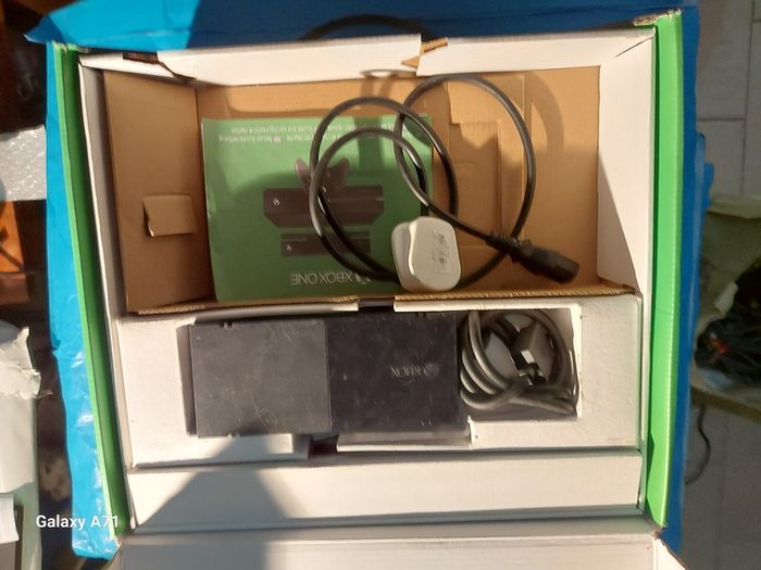 XBOX ONE, Comes in Box with Charger and literature, No Controller, but will include similar controller for XBOX 360, excellent condition