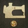Sewing machine, pin back badge. Image 2